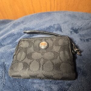 black Coach Signature canvas wristlet